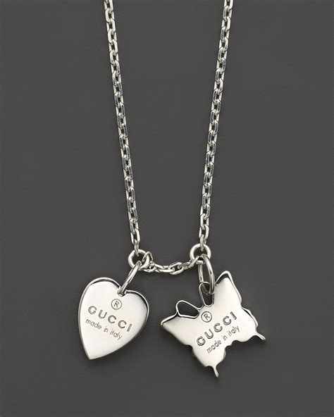 gucci silver butterfly necklace|heart necklace with gucci trademark.